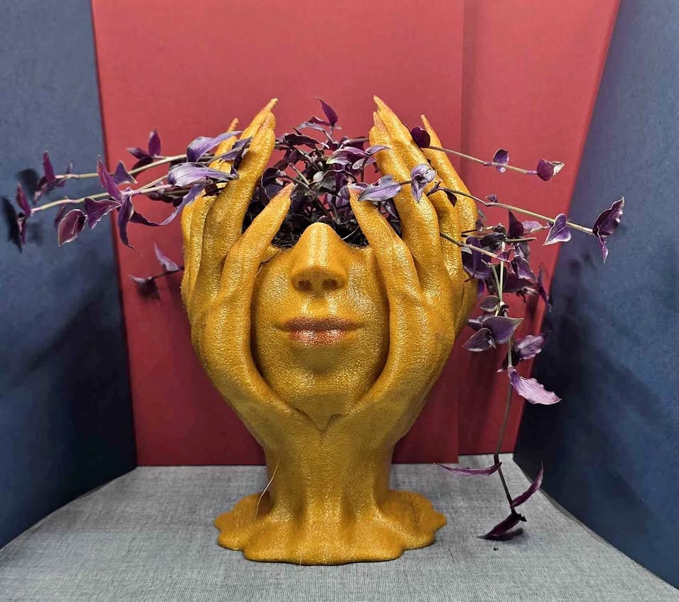 Sculpted goddess planter with cascading Purple Bridal Veil Tradescantia.